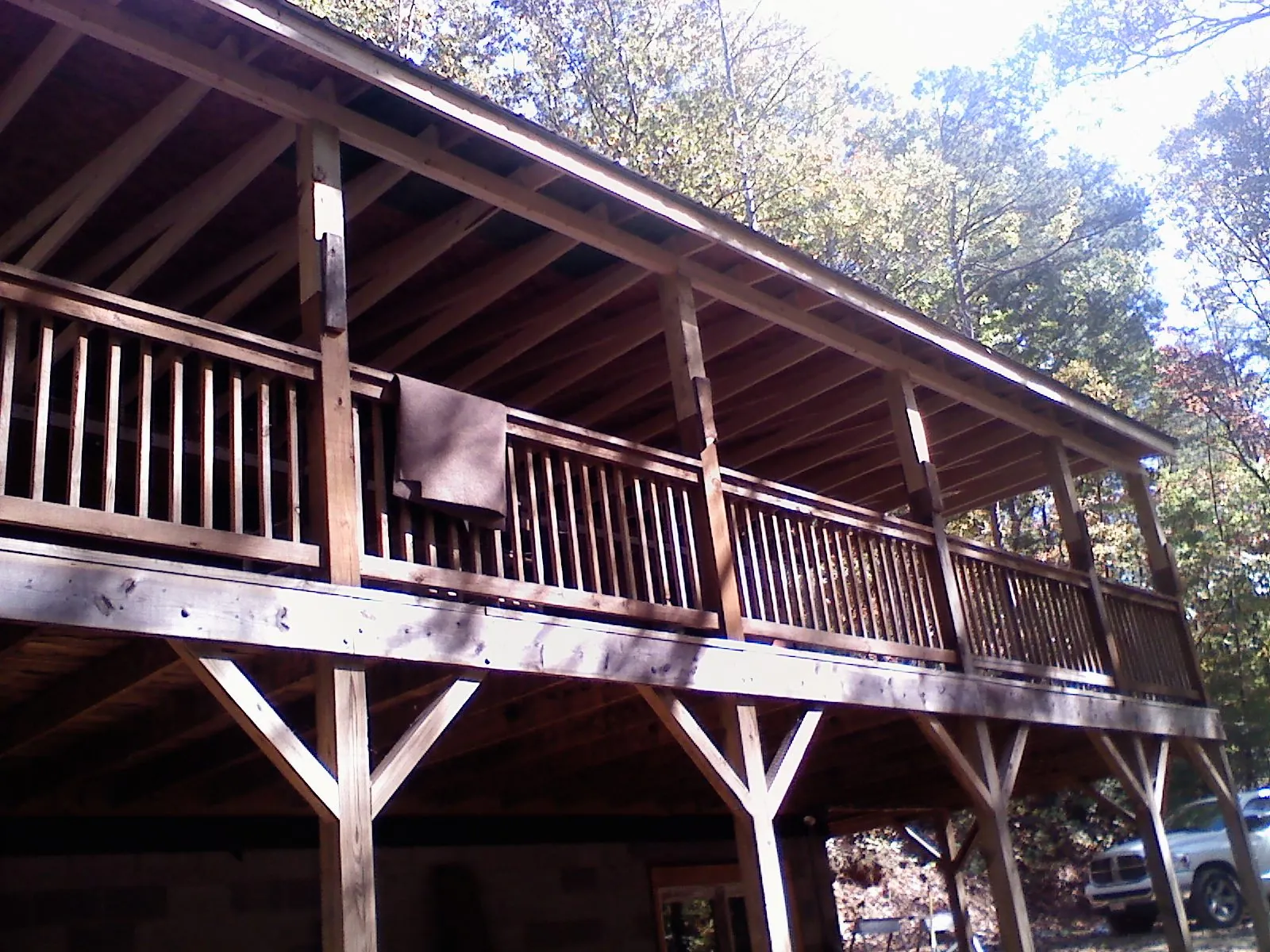Timber framing under a new elevated porch and deck — Roof Leak Repair in Norwell by Roofing Brothers